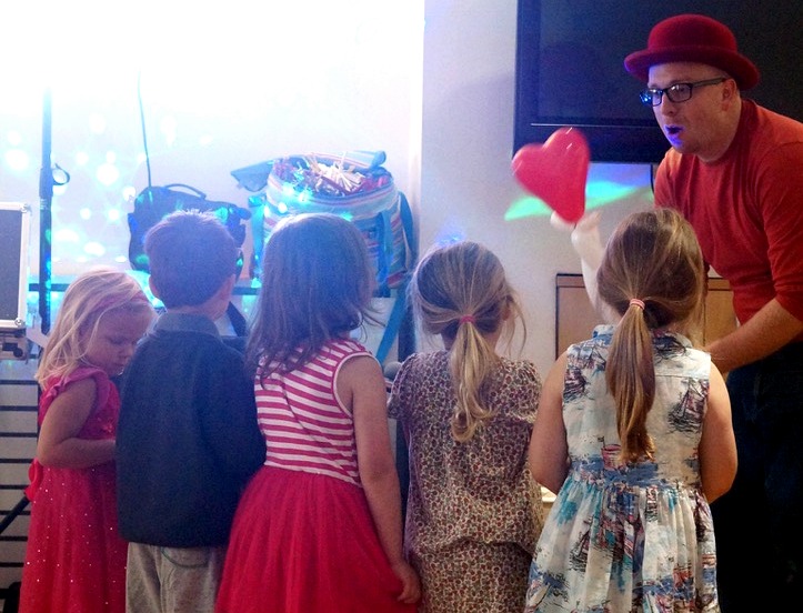 Benny making balloons for children