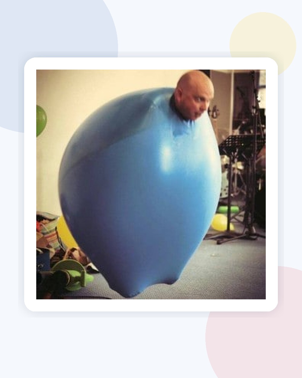 Benny Balloon performing the climb-inside balloon routine