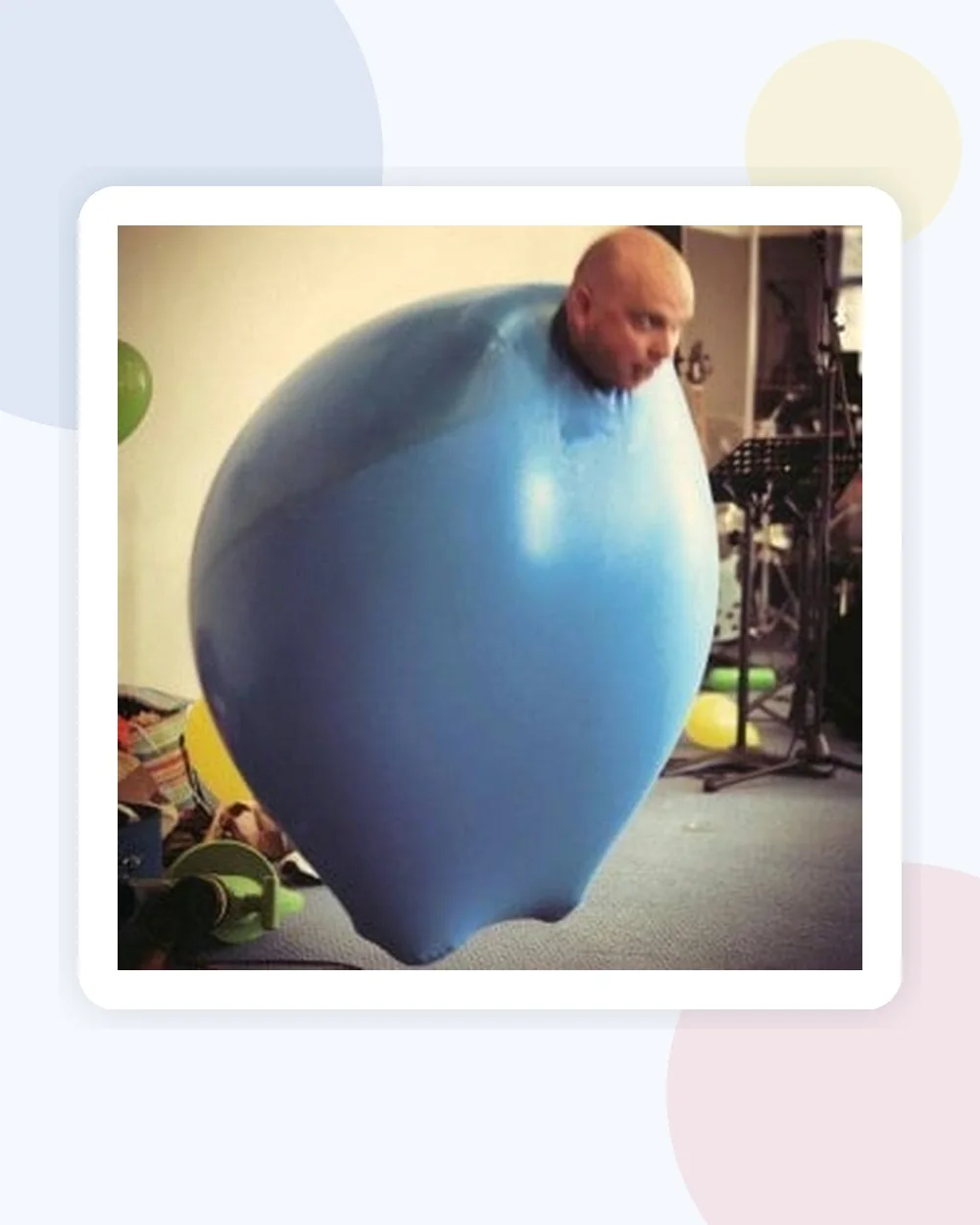 Benny Balloon performing the climb-inside balloon routine